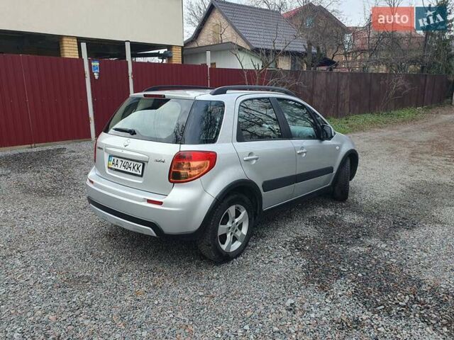 Серый Сузуки СХ4, объемом двигателя 1.6 л и пробегом 118 тыс. км за 9500 $, фото 2 на Automoto.ua