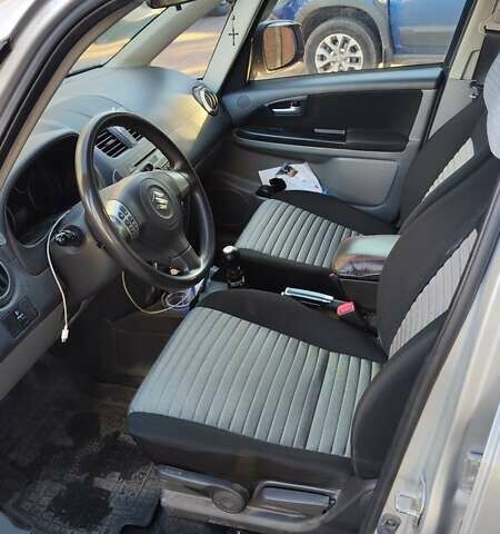 Серый Сузуки СХ4, объемом двигателя 1.6 л и пробегом 168 тыс. км за 6800 $, фото 4 на Automoto.ua