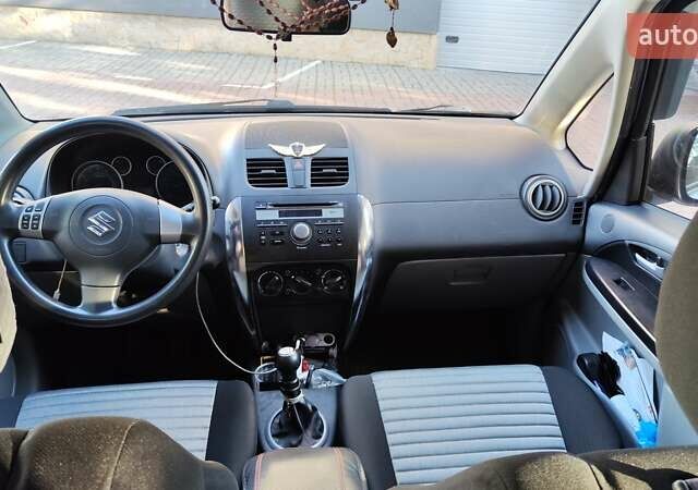 Серый Сузуки СХ4, объемом двигателя 1.6 л и пробегом 168 тыс. км за 6800 $, фото 5 на Automoto.ua