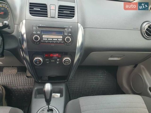 Серый Сузуки СХ4, объемом двигателя 1.6 л и пробегом 118 тыс. км за 9500 $, фото 9 на Automoto.ua