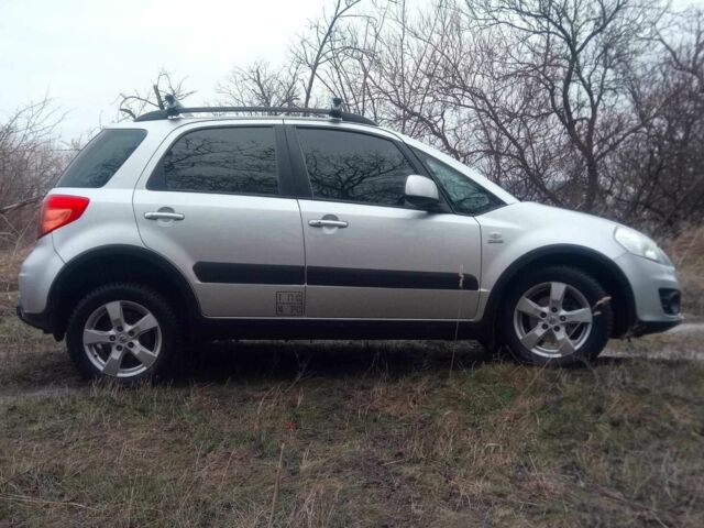 Сузуки СХ4 2013 в Светловдске на Automoto.ua Серый Сузуки СХ4, объемом двигателя 2 л и пробегом 164 тыс. км за 12500 $, фото 6 на Automoto.ua