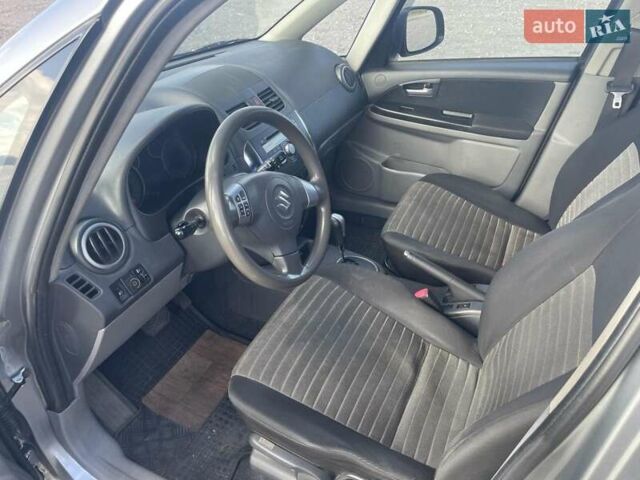 Серый Сузуки СХ4, объемом двигателя 1.59 л и пробегом 292 тыс. км за 8300 $, фото 5 на Automoto.ua