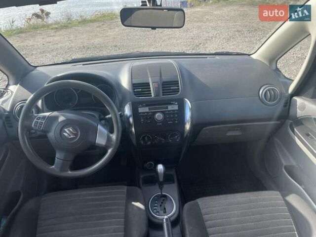 Серый Сузуки СХ4, объемом двигателя 1.59 л и пробегом 292 тыс. км за 8300 $, фото 7 на Automoto.ua