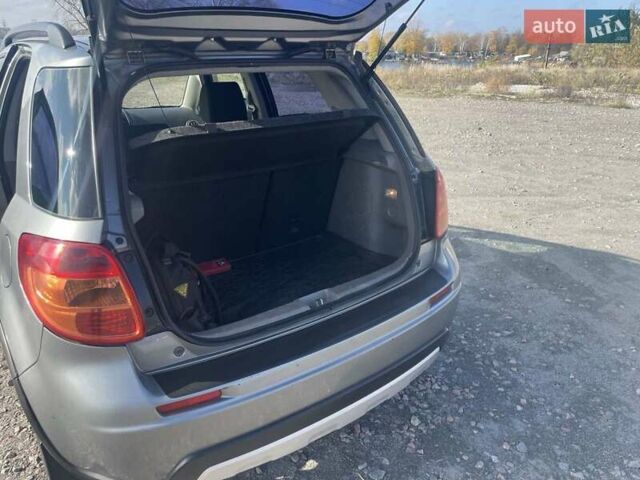 Серый Сузуки СХ4, объемом двигателя 1.59 л и пробегом 292 тыс. км за 8300 $, фото 9 на Automoto.ua