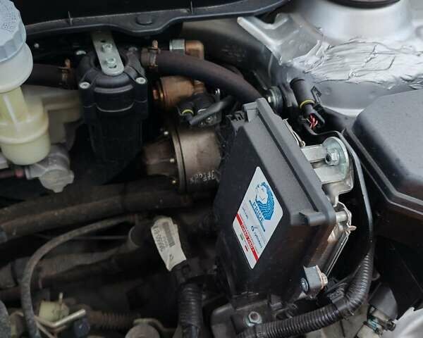 Серый Сузуки СХ4, объемом двигателя 1.59 л и пробегом 63 тыс. км за 17000 $, фото 25 на Automoto.ua