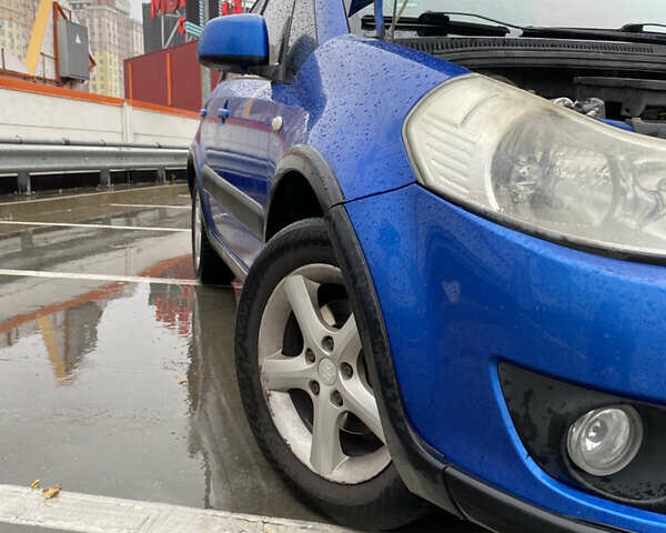 Синий Сузуки СХ4, объемом двигателя 1.59 л и пробегом 286 тыс. км за 4999 $, фото 20 на Automoto.ua