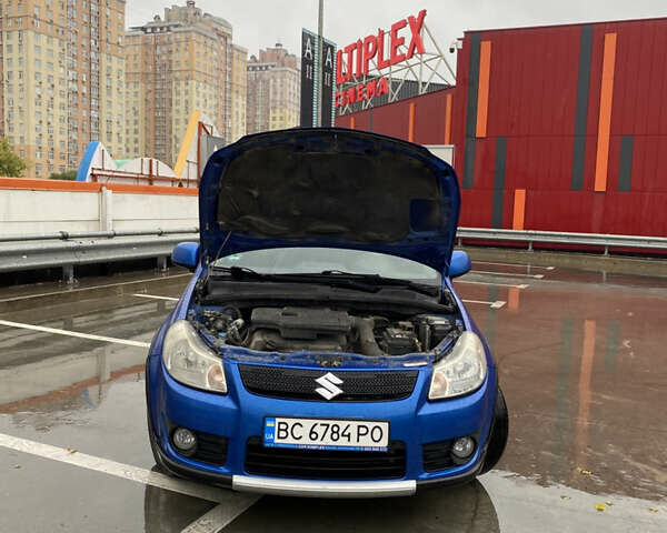 Синий Сузуки СХ4, объемом двигателя 1.59 л и пробегом 286 тыс. км за 4999 $, фото 22 на Automoto.ua