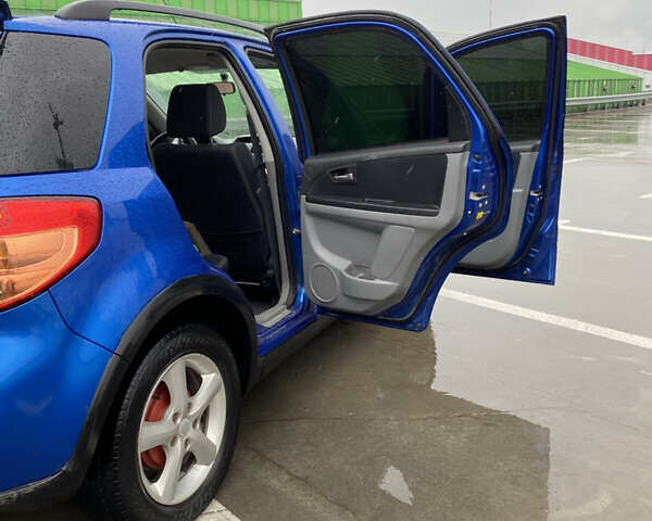 Синий Сузуки СХ4, объемом двигателя 1.59 л и пробегом 286 тыс. км за 4999 $, фото 6 на Automoto.ua