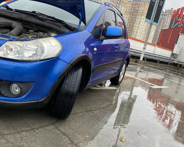 Синий Сузуки СХ4, объемом двигателя 1.59 л и пробегом 286 тыс. км за 4999 $, фото 21 на Automoto.ua