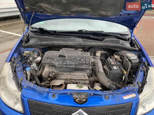 Синий Сузуки СХ4, объемом двигателя 1.59 л и пробегом 286 тыс. км за 4999 $, фото 23 на Automoto.ua