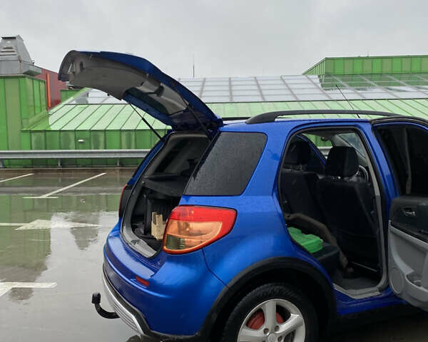 Синий Сузуки СХ4, объемом двигателя 1.59 л и пробегом 286 тыс. км за 4999 $, фото 7 на Automoto.ua