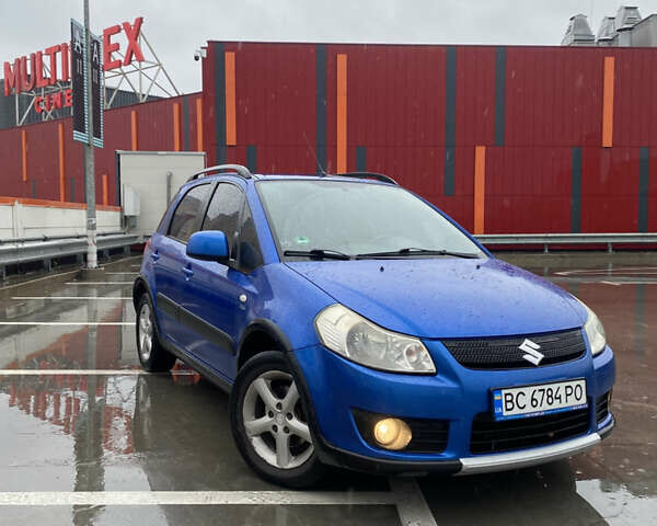 Синий Сузуки СХ4, объемом двигателя 1.59 л и пробегом 286 тыс. км за 4999 $, фото 2 на Automoto.ua