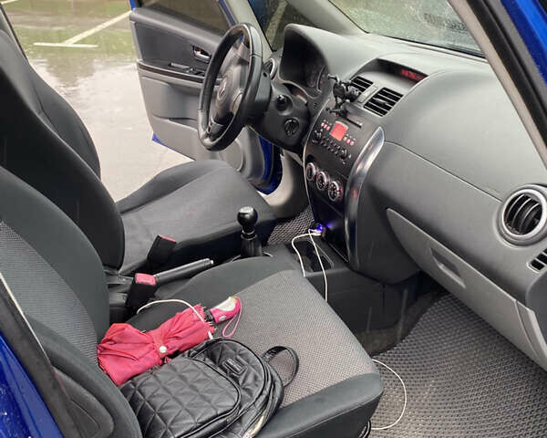 Синий Сузуки СХ4, объемом двигателя 1.59 л и пробегом 286 тыс. км за 4999 $, фото 9 на Automoto.ua