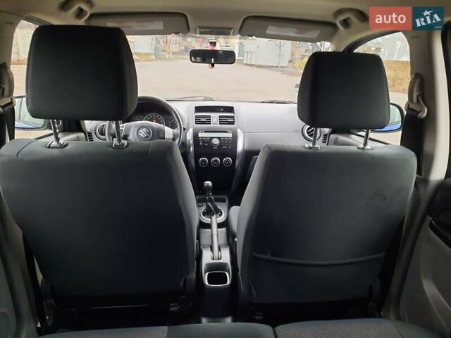 Синий Сузуки СХ4, объемом двигателя 1.6 л и пробегом 174 тыс. км за 6300 $, фото 78 на Automoto.ua