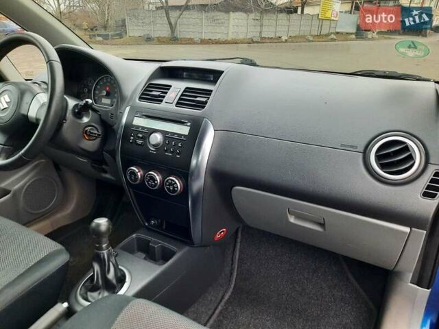 Синий Сузуки СХ4, объемом двигателя 1.6 л и пробегом 174 тыс. км за 6300 $, фото 92 на Automoto.ua