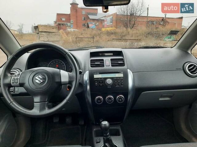 Синий Сузуки СХ4, объемом двигателя 1.6 л и пробегом 174 тыс. км за 6300 $, фото 51 на Automoto.ua