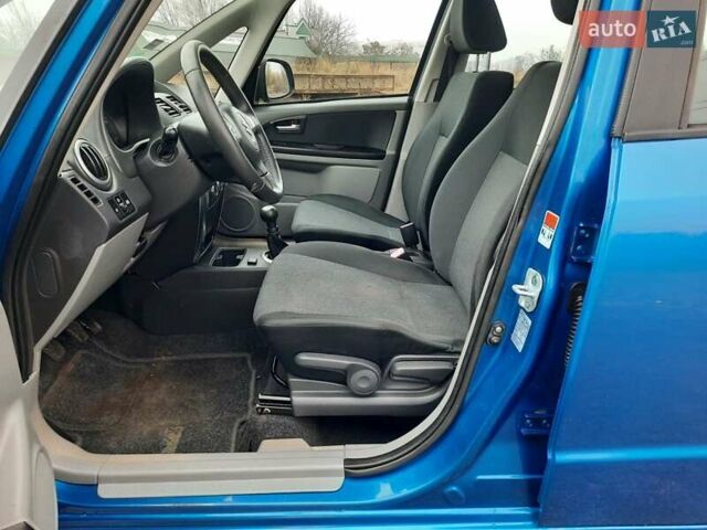 Синий Сузуки СХ4, объемом двигателя 1.6 л и пробегом 174 тыс. км за 6300 $, фото 35 на Automoto.ua