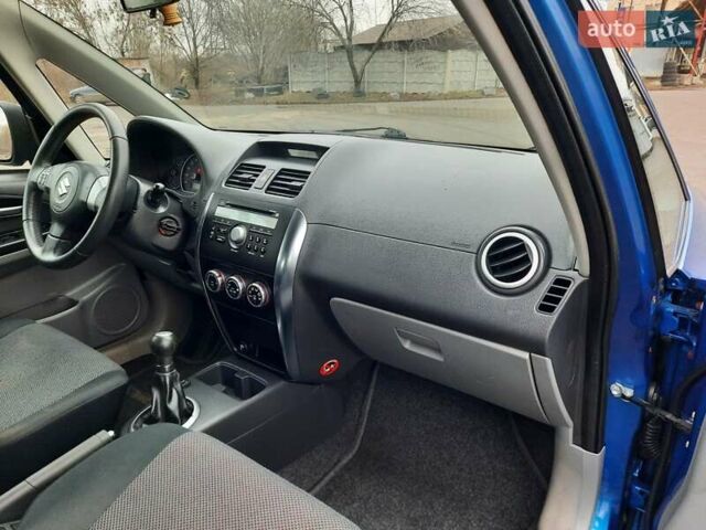 Синий Сузуки СХ4, объемом двигателя 1.6 л и пробегом 174 тыс. км за 6300 $, фото 91 на Automoto.ua