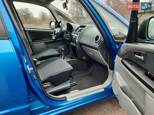 Синий Сузуки СХ4, объемом двигателя 1.6 л и пробегом 174 тыс. км за 6300 $, фото 90 на Automoto.ua