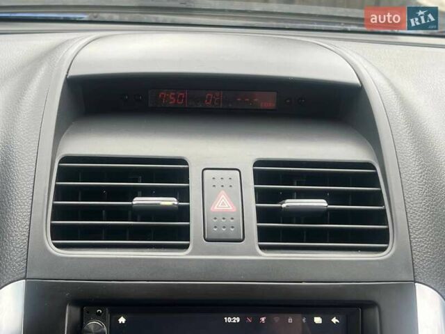 Синий Сузуки СХ4, объемом двигателя 1.56 л и пробегом 227 тыс. км за 5990 $, фото 19 на Automoto.ua