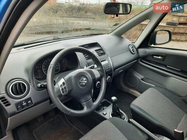 Синий Сузуки СХ4, объемом двигателя 1.6 л и пробегом 174 тыс. км за 6300 $, фото 55 на Automoto.ua