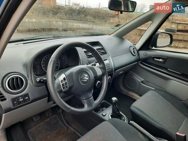 Синий Сузуки СХ4, объемом двигателя 1.6 л и пробегом 174 тыс. км за 6300 $, фото 37 на Automoto.ua