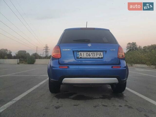 Синий Сузуки СХ4, объемом двигателя 1.56 л и пробегом 224 тыс. км за 6800 $, фото 1 на Automoto.ua