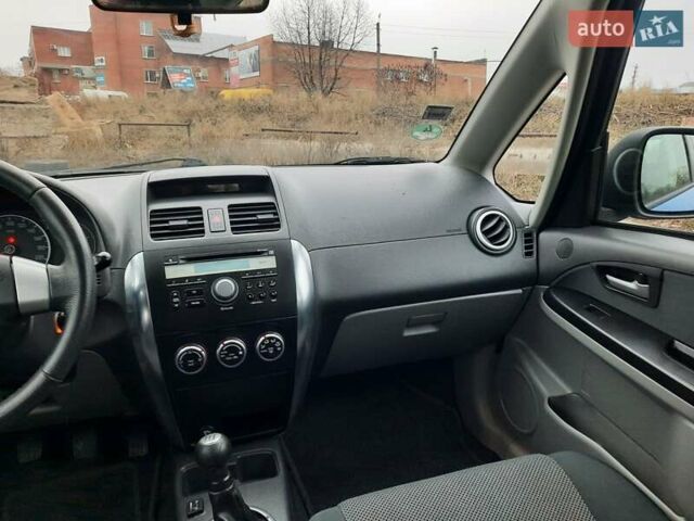 Синий Сузуки СХ4, объемом двигателя 1.6 л и пробегом 174 тыс. км за 6300 $, фото 53 на Automoto.ua