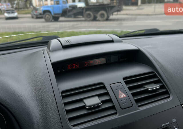 Синій Сузукі СХ4, об'ємом двигуна 2 л та пробігом 192 тис. км за 6999 $, фото 12 на Automoto.ua