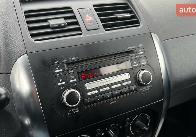 Синій Сузукі СХ4, об'ємом двигуна 2 л та пробігом 192 тис. км за 6999 $, фото 13 на Automoto.ua