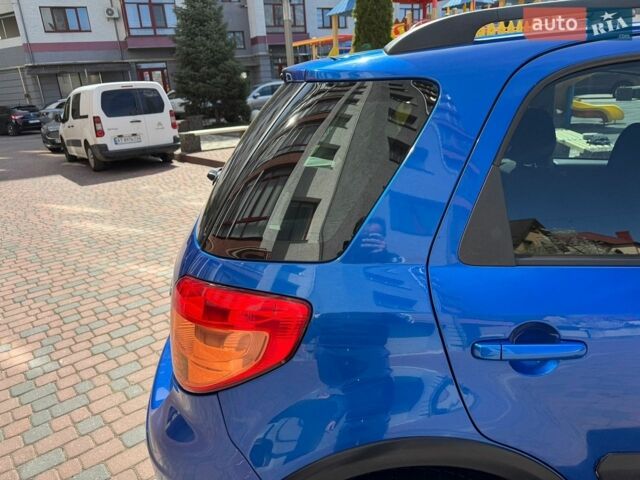 Синий Сузуки СХ4, объемом двигателя 1.6 л и пробегом 239 тыс. км за 4650 $, фото 89 на Automoto.ua