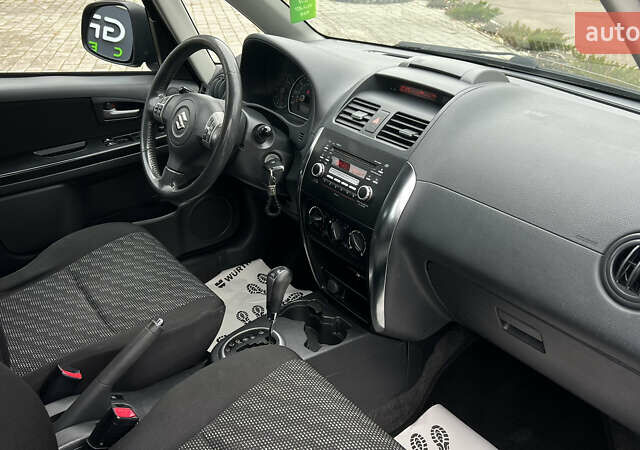 Синій Сузукі СХ4, об'ємом двигуна 2 л та пробігом 192 тис. км за 6999 $, фото 32 на Automoto.ua