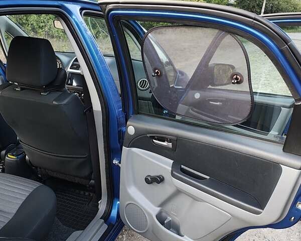 Синій Сузукі СХ4, об'ємом двигуна 1.59 л та пробігом 173 тис. км за 5950 $, фото 8 на Automoto.ua