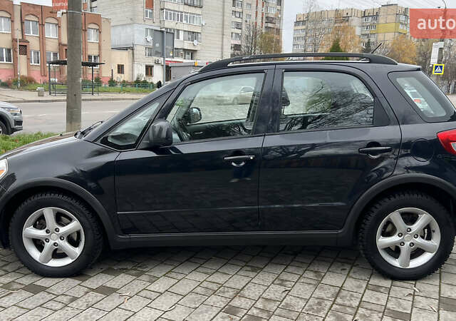 Синій Сузукі СХ4, об'ємом двигуна 2 л та пробігом 192 тис. км за 6999 $, фото 4 на Automoto.ua