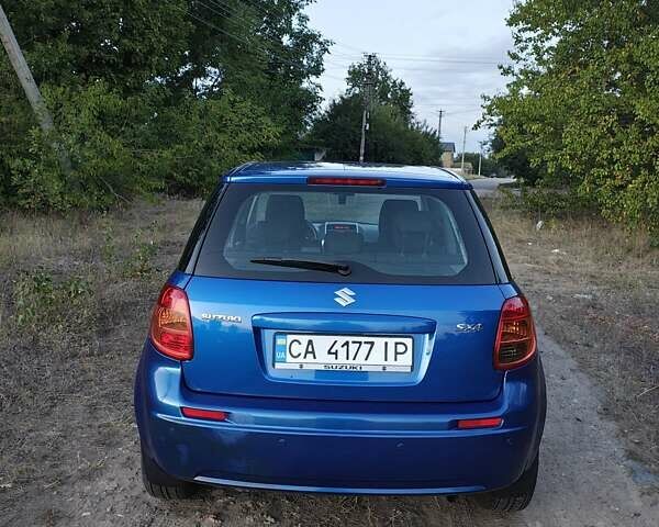 Синій Сузукі СХ4, об'ємом двигуна 1.59 л та пробігом 173 тис. км за 5950 $, фото 2 на Automoto.ua