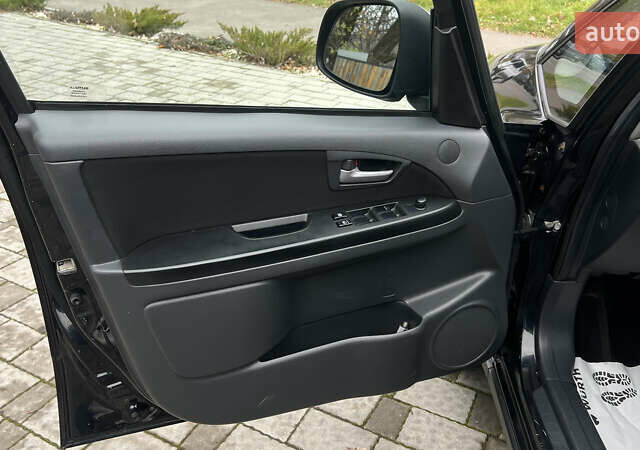 Синій Сузукі СХ4, об'ємом двигуна 2 л та пробігом 192 тис. км за 6999 $, фото 26 на Automoto.ua