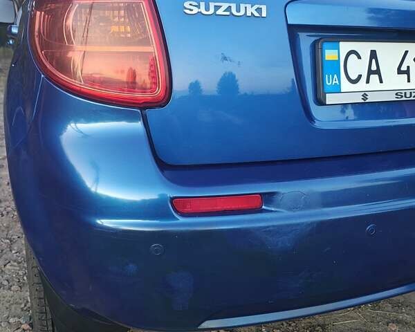 Синій Сузукі СХ4, об'ємом двигуна 1.59 л та пробігом 173 тис. км за 5950 $, фото 18 на Automoto.ua