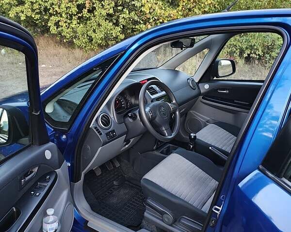 Синій Сузукі СХ4, об'ємом двигуна 1.59 л та пробігом 173 тис. км за 5950 $, фото 4 на Automoto.ua