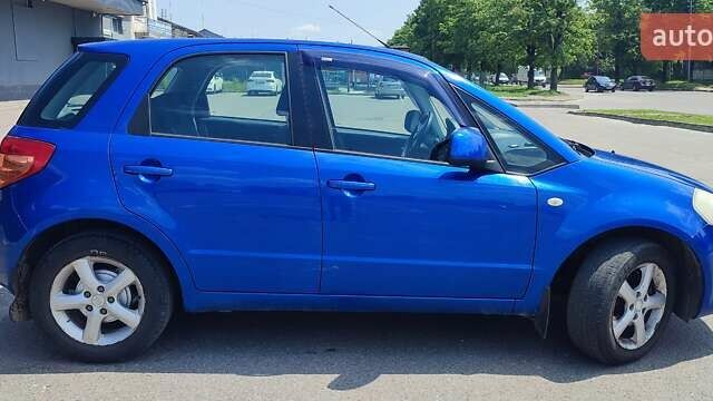 Синий Сузуки СХ4, объемом двигателя 1.59 л и пробегом 224 тыс. км за 5399 $, фото 5 на Automoto.ua