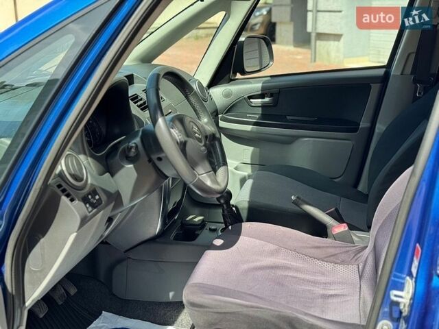 Синий Сузуки СХ4, объемом двигателя 1.6 л и пробегом 239 тыс. км за 4999 $, фото 116 на Automoto.ua