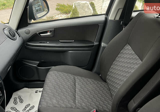 Синій Сузукі СХ4, об'ємом двигуна 2 л та пробігом 192 тис. км за 6999 $, фото 25 на Automoto.ua