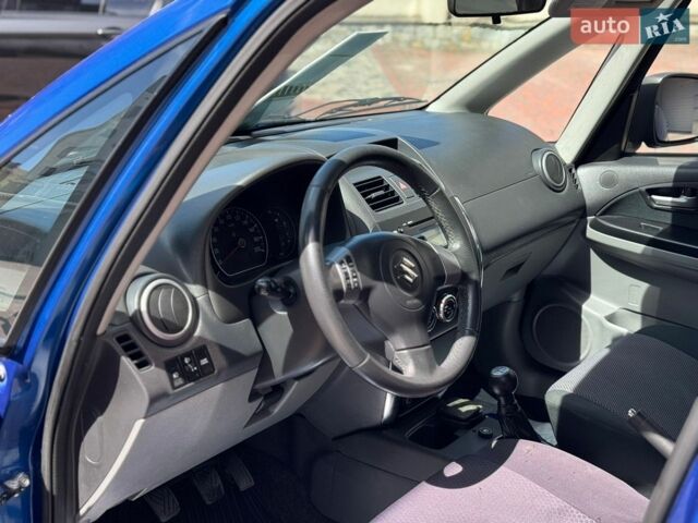 Синий Сузуки СХ4, объемом двигателя 1.6 л и пробегом 239 тыс. км за 4650 $, фото 115 на Automoto.ua