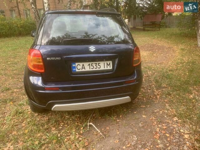 Синий Сузуки СХ4, объемом двигателя 1.59 л и пробегом 151 тыс. км за 4200 $, фото 2 на Automoto.ua