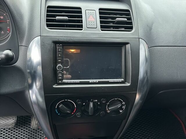 Синий Сузуки СХ4, объемом двигателя 1.6 л и пробегом 315 тыс. км за 4600 $, фото 11 на Automoto.ua