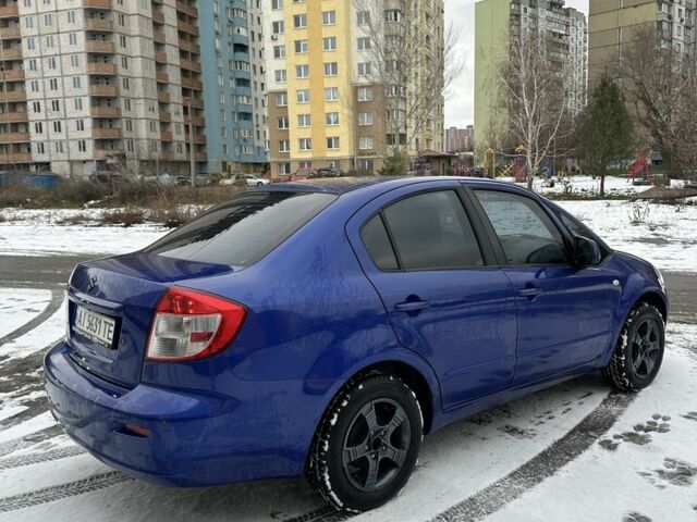 Синий Сузуки СХ4, объемом двигателя 1.6 л и пробегом 315 тыс. км за 4600 $, фото 3 на Automoto.ua