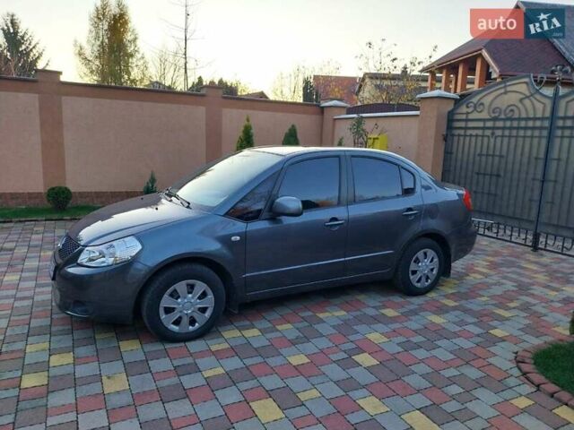 Синий Сузуки СХ4, объемом двигателя 1.59 л и пробегом 114 тыс. км за 4200 $, фото 6 на Automoto.ua