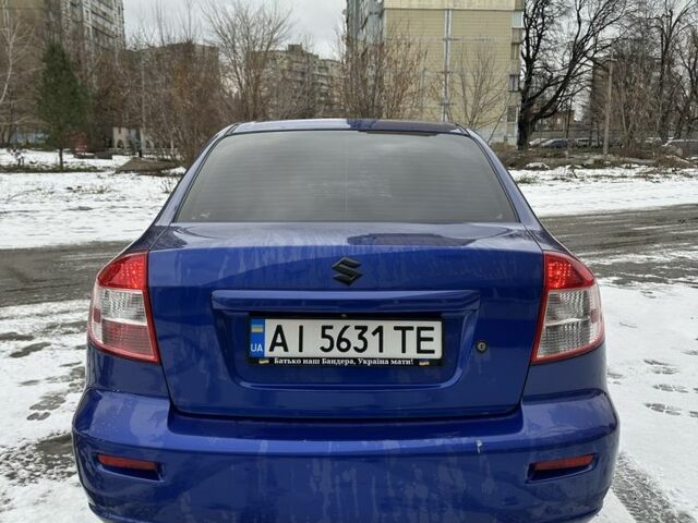 Синий Сузуки СХ4, объемом двигателя 1.6 л и пробегом 315 тыс. км за 4600 $, фото 5 на Automoto.ua