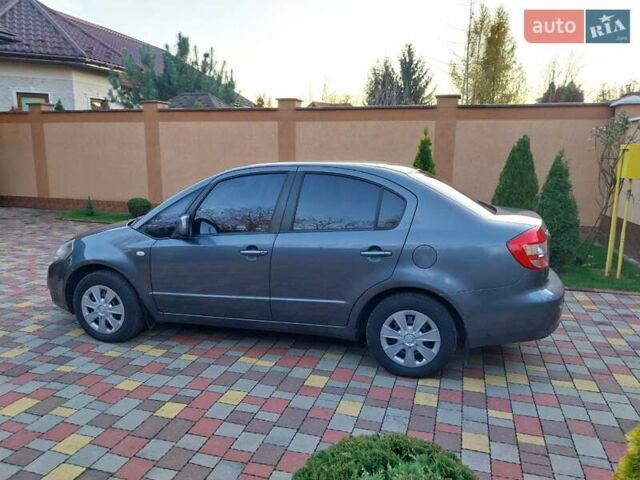 Синий Сузуки СХ4, объемом двигателя 1.59 л и пробегом 114 тыс. км за 4200 $, фото 11 на Automoto.ua