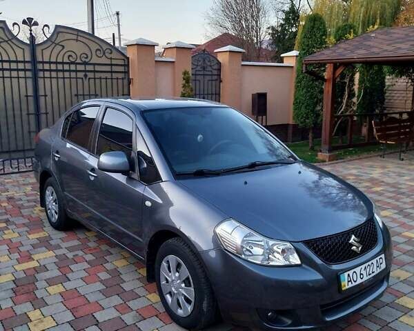 Синий Сузуки СХ4, объемом двигателя 1.59 л и пробегом 114 тыс. км за 4200 $, фото 10 на Automoto.ua