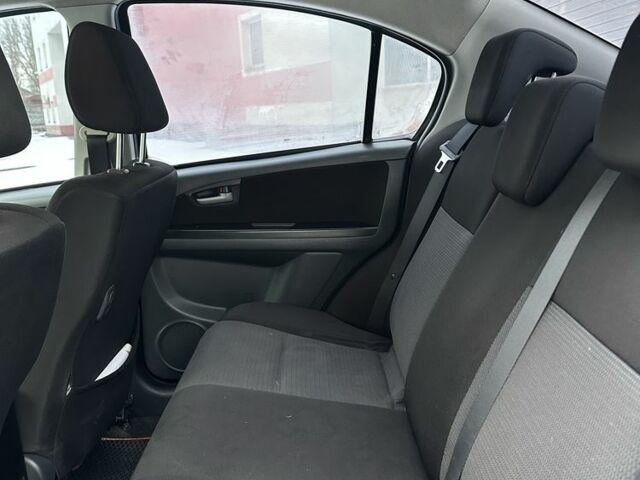 Синий Сузуки СХ4, объемом двигателя 1.6 л и пробегом 315 тыс. км за 4600 $, фото 6 на Automoto.ua